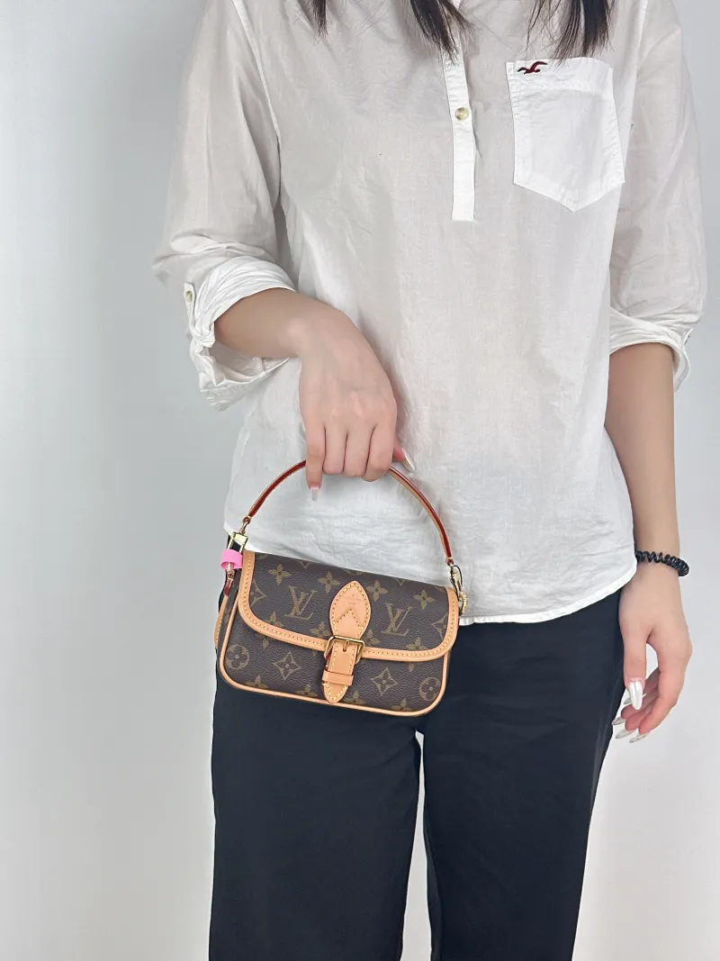 Louis Vuitton Crossbody Bag Diane Baguette Bag Monogram PV Cnano19 × 6 × 10.5 cm — on-model view 1 of 3
