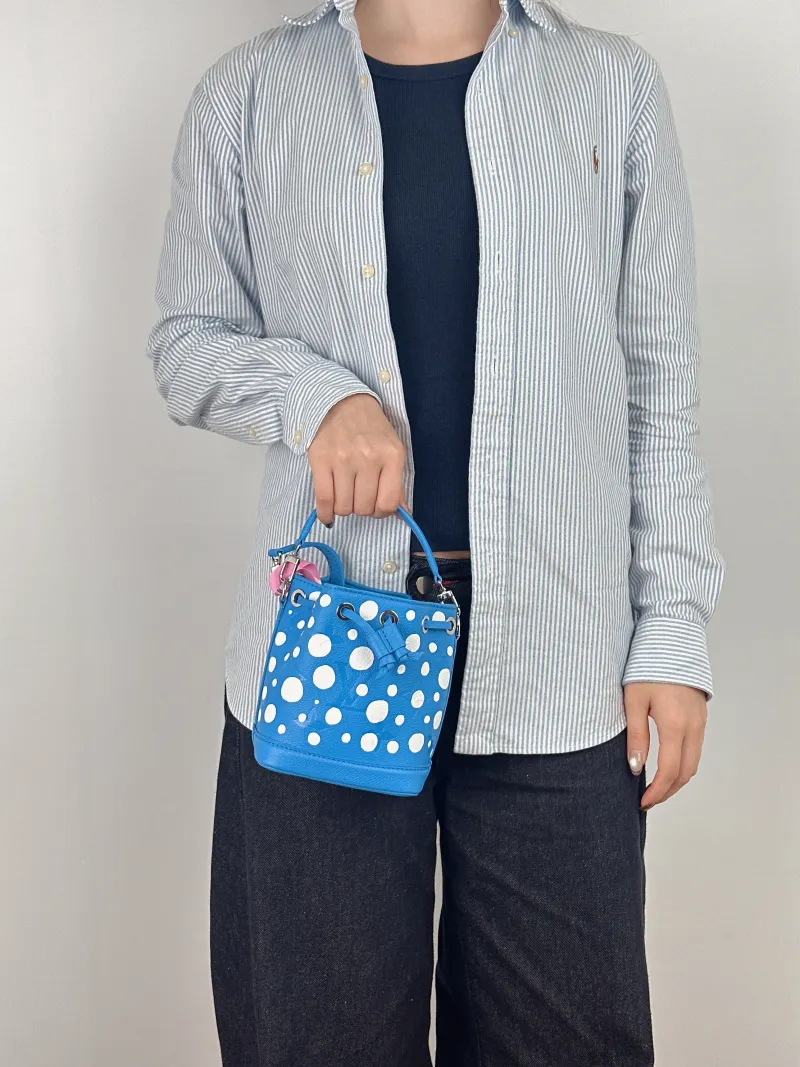 Louis Vuitton Shoulder Bag NANO NOÉ Bucket Bag Nano - Calfskin nano 13 × 10 × 16 cm — on-model view 1 of 3