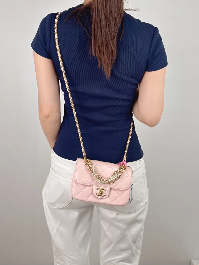 Chanel Crossbody Bag 24a Pearl Pink Lambskin Mini 19 × 7 × 13 cm — on-model view 3 of 3