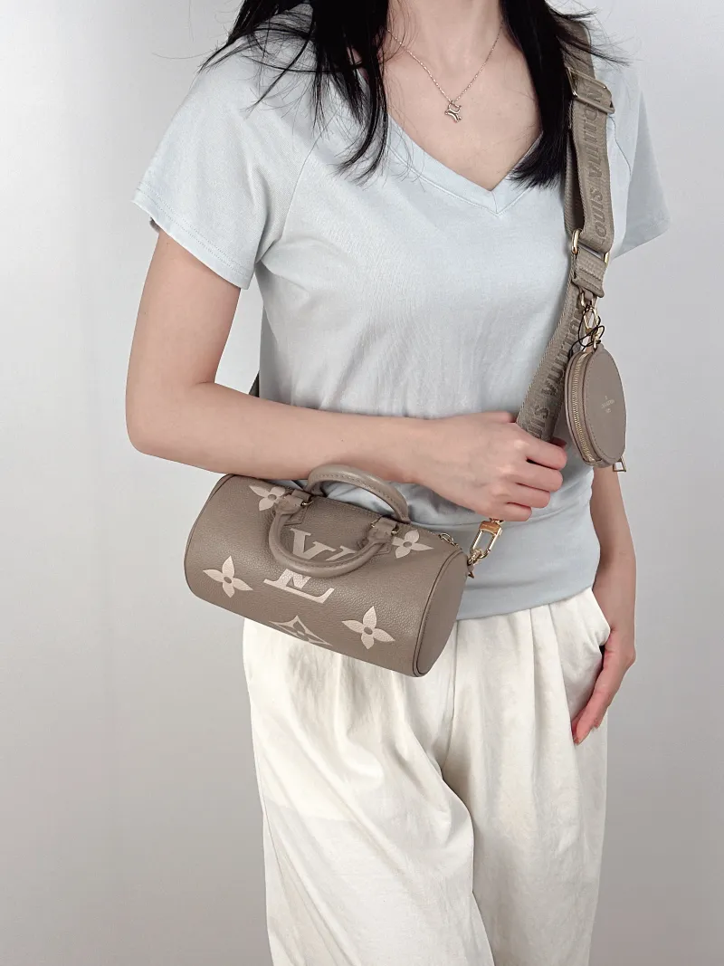 Louis Vuitton Crossbody Bag Papillon · White Empreinte Embossed Calfskin Monogram BB20 × 10 × 10 cm — on-model view 3 of 3