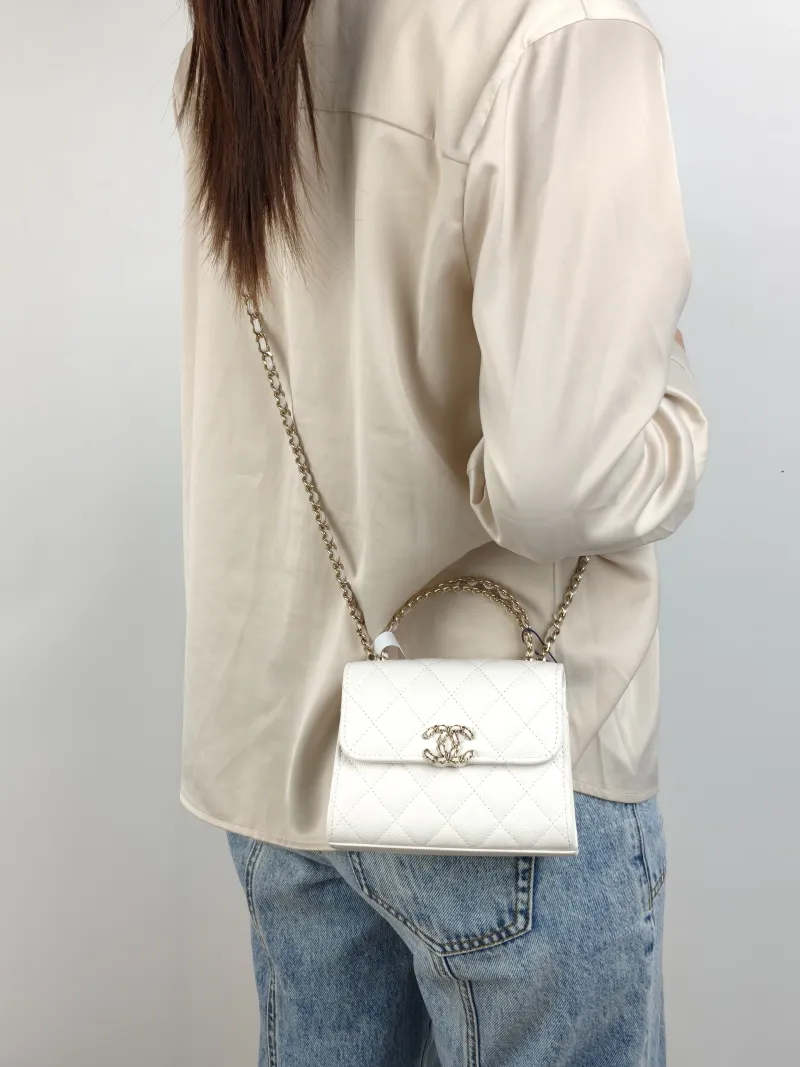 Chanel Crossbody Bag kelly White Grained Calfskin nano 15 × 5 × 11 cm — on-model view 2 of 3