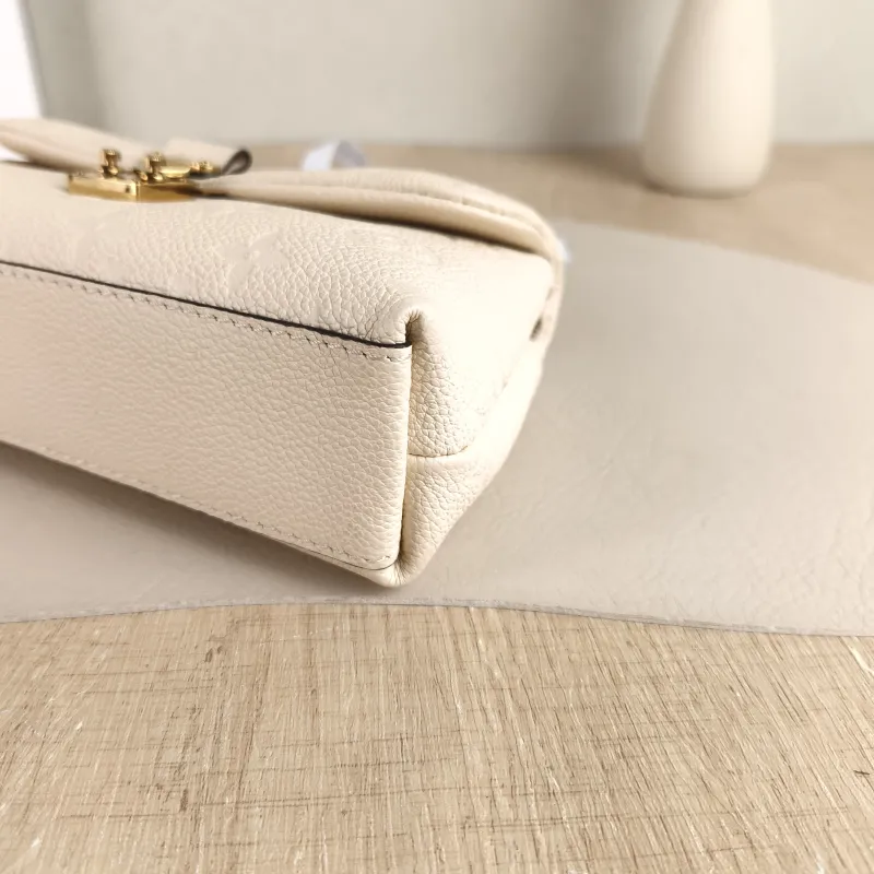 Louis Vuitton Crossbody Bag MADELEINE White Empreinte Embossed Calfskin nano 21 × 6 × 12.5 cm — detail view 3 of 11
