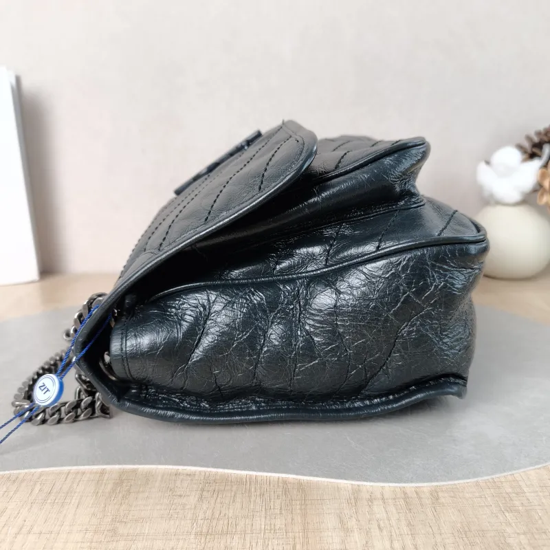 SAINT LAURENT Crossbody Bag Niki Green Waxed Leather Medium 28 × 8.5 × 20 cm — detail view 10 of 15