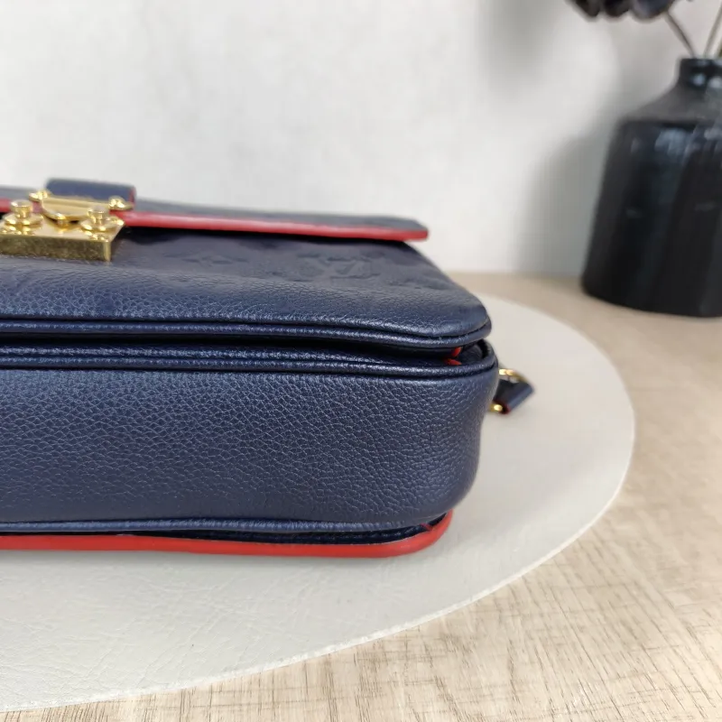 Louis Vuitton Crossbody Bag Pochette Métis · Monogram Empreinte Embossed Calfskin Medium 25 × 7 × 19 cm — detail view 2 of 13