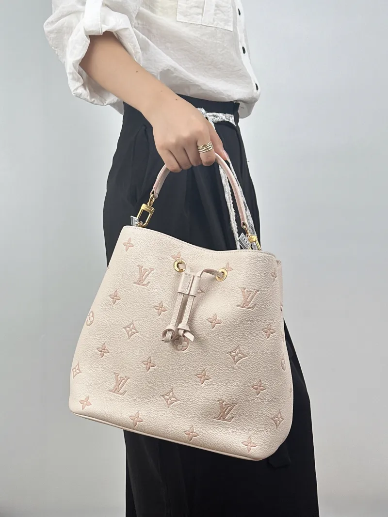 Louis Vuitton Shoulder Bag NÉONOÉ Bucket Bag White Empreinte Embossed Calfskin Medium26 × 17.5 × 26 cm — on-model view 3 of 3