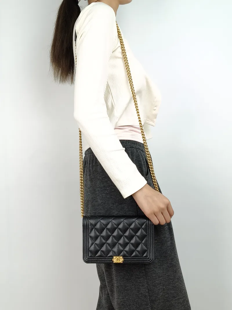 Chanel Crossbody Bag Le Boy​ WOC Black Grained Calfskinmini19.2 × 3.5 × 12.3 cm — on-model view 1 of 3