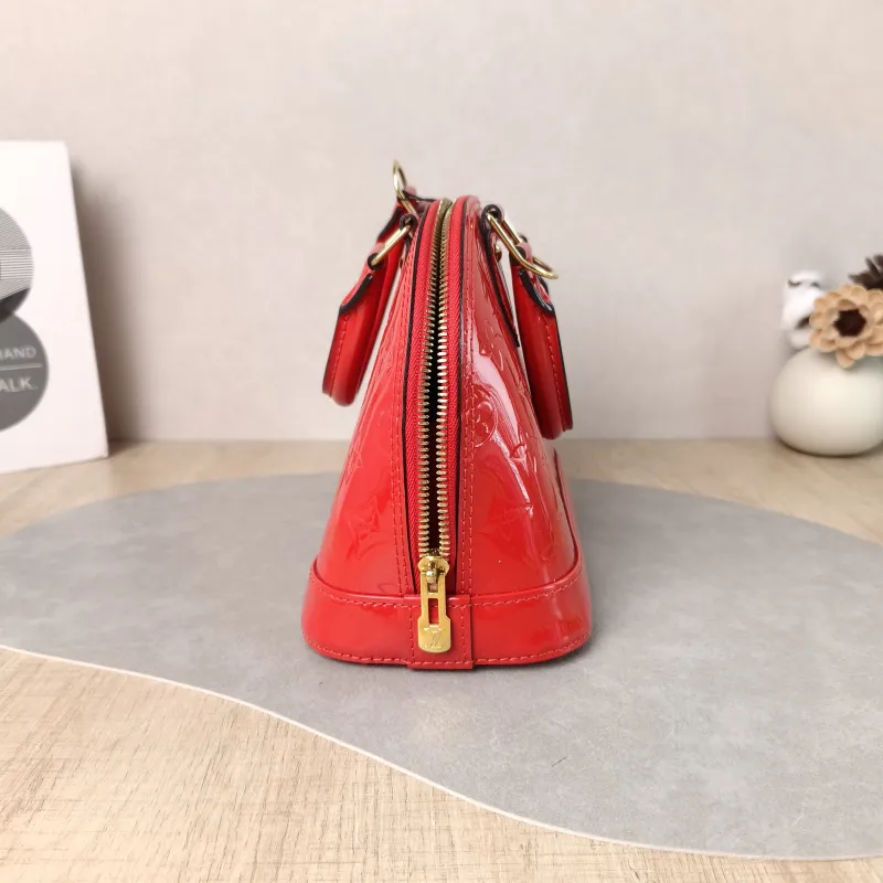 Louis Vuitton Crossbody Bag Alma BB Patent Leather BB 23.5 × 11.5 × 17.5 cm — detail view 2 of 11