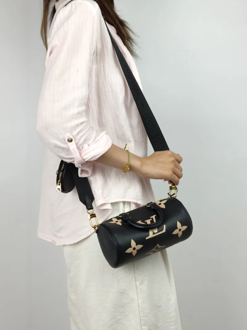 Louis Vuitton Crossbody Bag Papillon Black · White Monogram Empreinte Embossed Calfskin BB 20 × 10 × 10 cm — on-model view 3 of 3