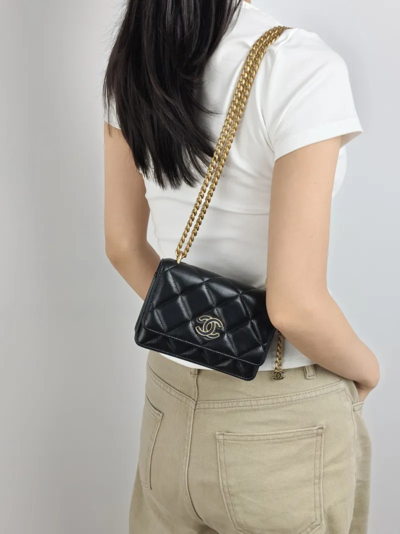 Chanel Crossbody Bag CF WOC Black Lambskin Mini 15 × 5 × 10 cm 31 — on-model view 3 of 3
