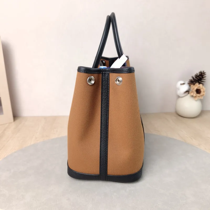 Hermès Top Handle Bag Garden Party 30 30 Brown Canvas · Negonda Calfskin Medium 30 × 13 × 21 cm B — detail view 2 of 9