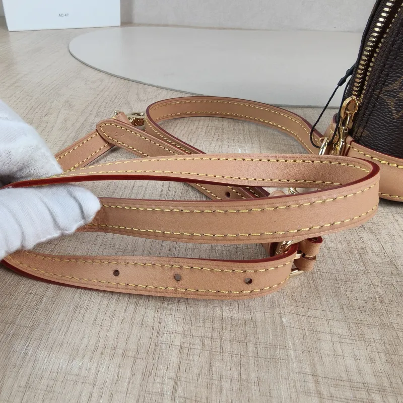 Louis Vuitton Crossbody Bag Alma Nano Monogram PVC nano 18 × 8 × 12 cm — detail view 3 of 12