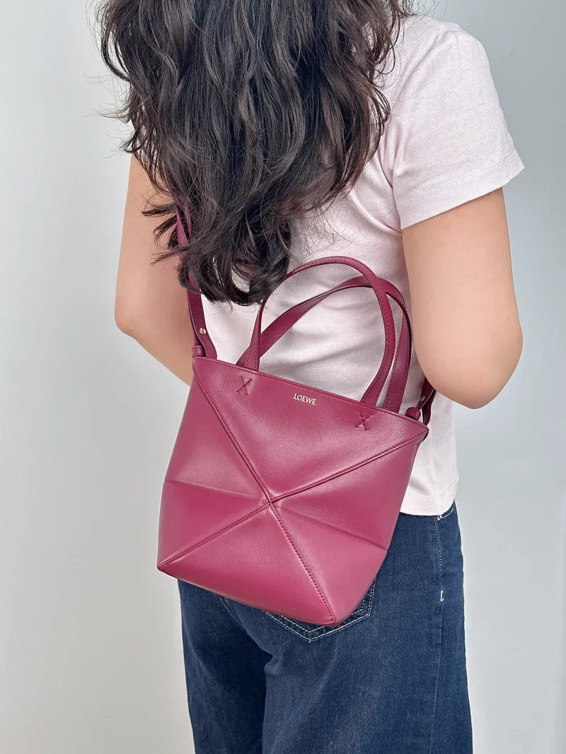 LOEWE Crossbody Bag Puzzle Fold Shopping Tote Red Calfskin Mini 16.5 × 9.5 × 20 cm — on-model view 1 of 2