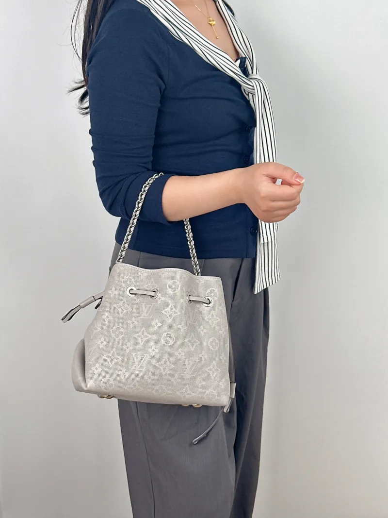 Louis Vuitton Crossbody Bag BELLA Grey Calfskin One Size 22 × 14 × 19 cm — on-model view 2 of 2