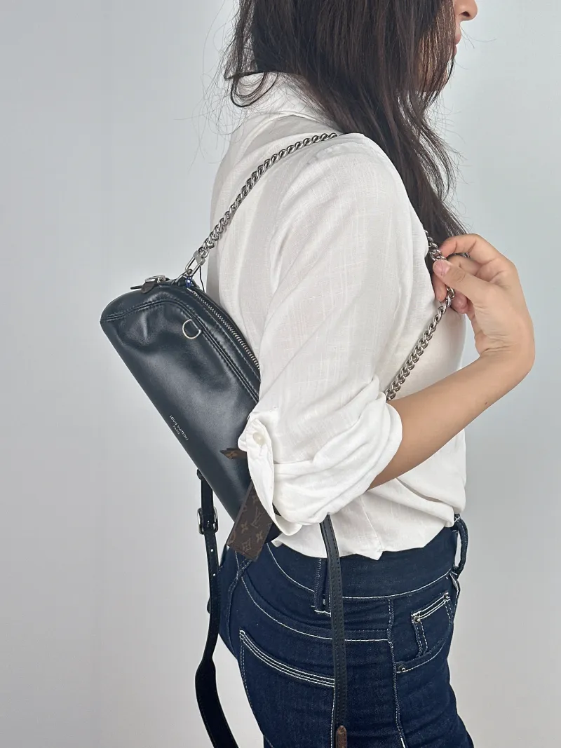Louis Vuitton Shoulder Bag Pochette Vibe Black SL ambskin One Size 25 × 7.5 × 10 cm — on-model view 1 of 2