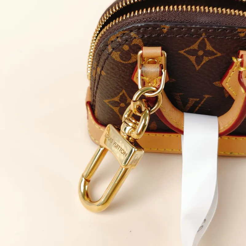 Louis Vuitton Key Ring alma Key Ring Monogram PVC One Size 8 × 4 × 6 cm — cover view 2 of 9