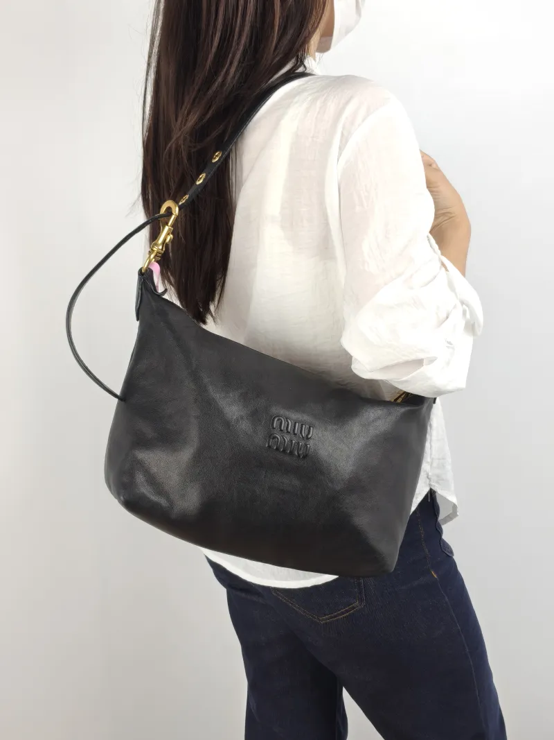 Miumiu Top Handle Bag Spirit Vanity Case Bag Cosmetic Bag Black Lambskin Medium 28 × 13 × 21.5 cm — on-model view 2 of 2