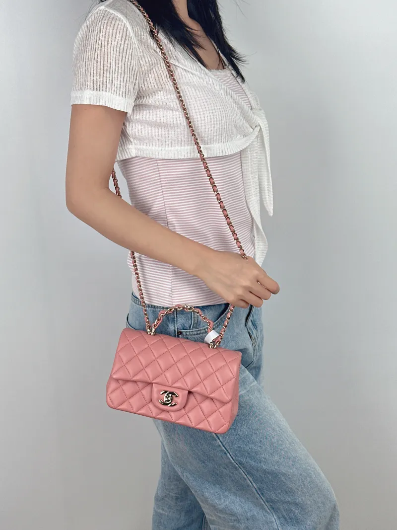 Chanel Crossbody Bag23k logo mini Pink Lambskin mini20 × 6 × 12 cm — on-model view 2 of 3
