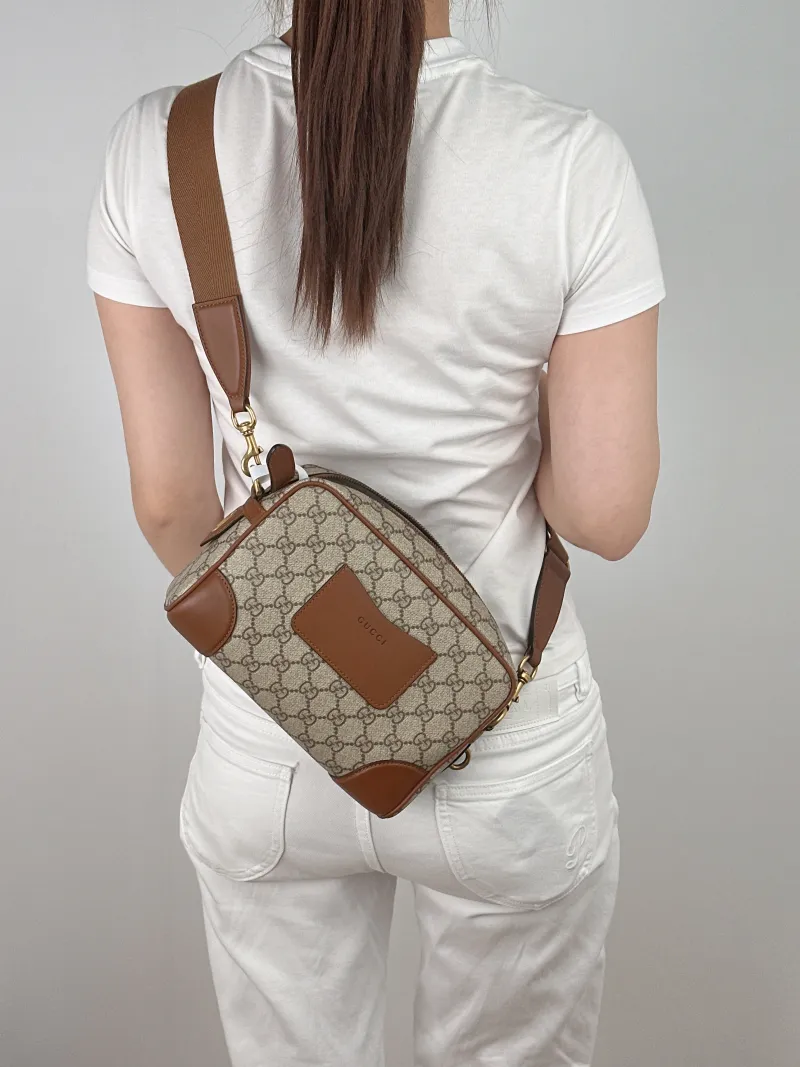 GUCCI Crossbody Bag GG Emblem Crossbody Bag Monogram PVC Small23 × 7 × 17 cm — on-model view 2 of 2