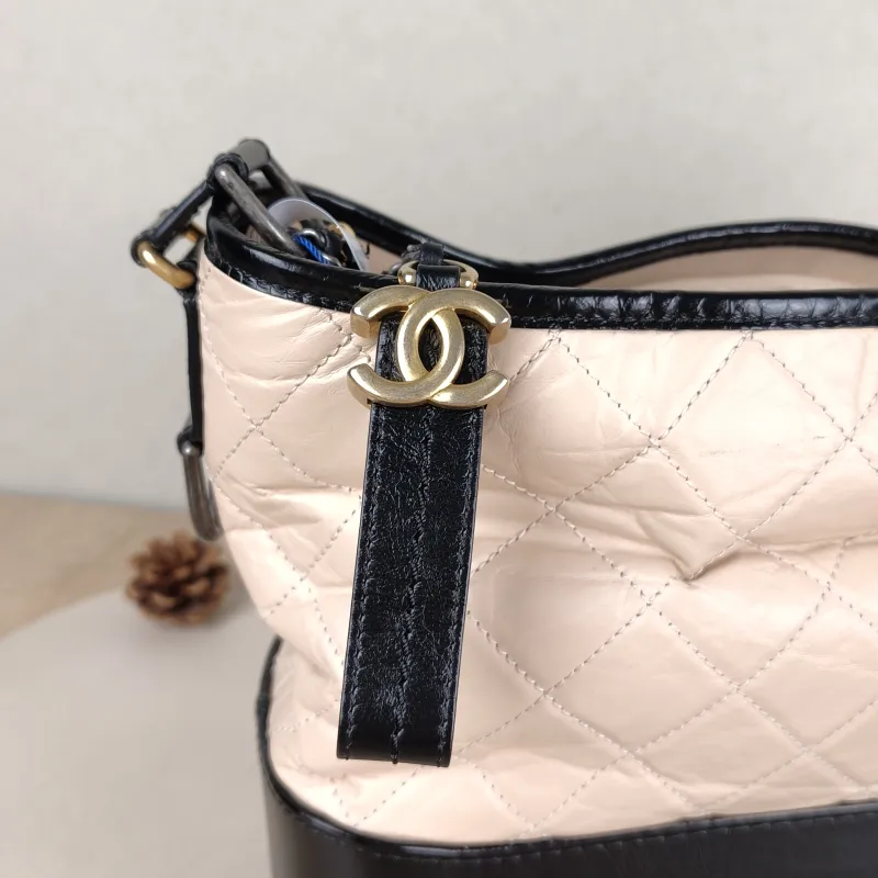 Chanel Crossbody Bag Gabrielle Gabrielle Bag Beige Black Large28 × 10 × 23 cm — detail view 1 of 13