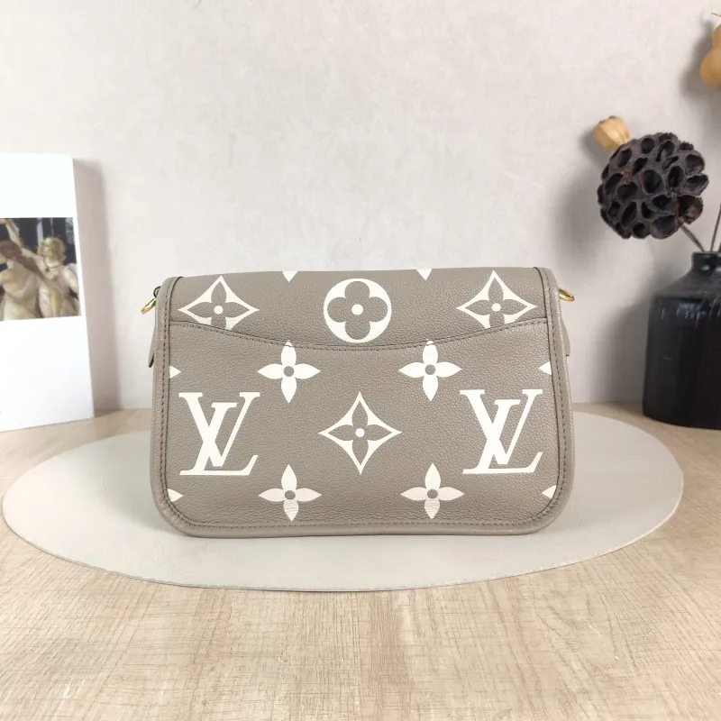 Louis Vuitton Crossbody Bag Diane Baguette Bag Monogram Empreinte Embossed Calfskin Small 24 × 9 × 15 cm — cover view 4 of 5