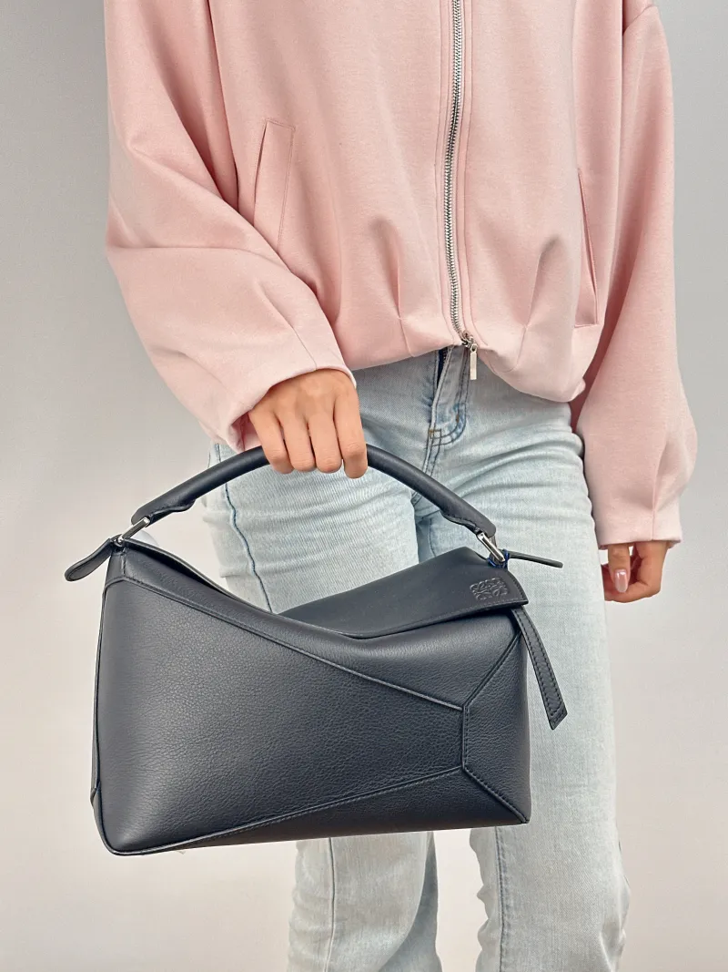 LOEWE Shoulder Bag Puzzle Black CC alfskin Medium 29 × 14 × 19.5 cm — on-model view 2 of 2