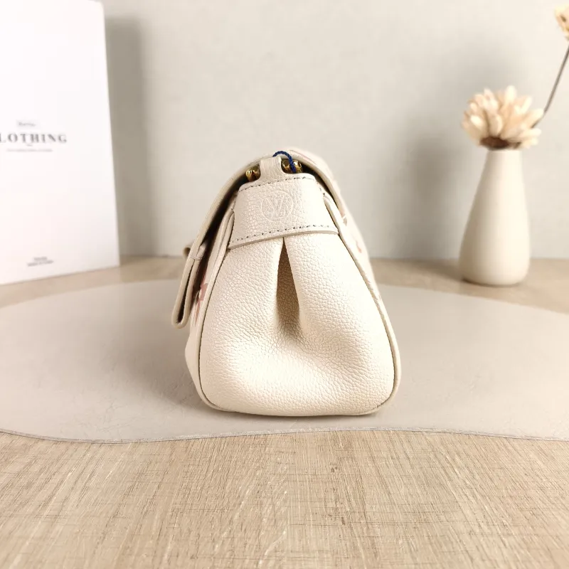 Louis Vuitton Crossbody Bag Favorite White · Pink Empreinte Embossed Calfskin Medium 24 × 9 × 14 cm — detail view 7 of 11