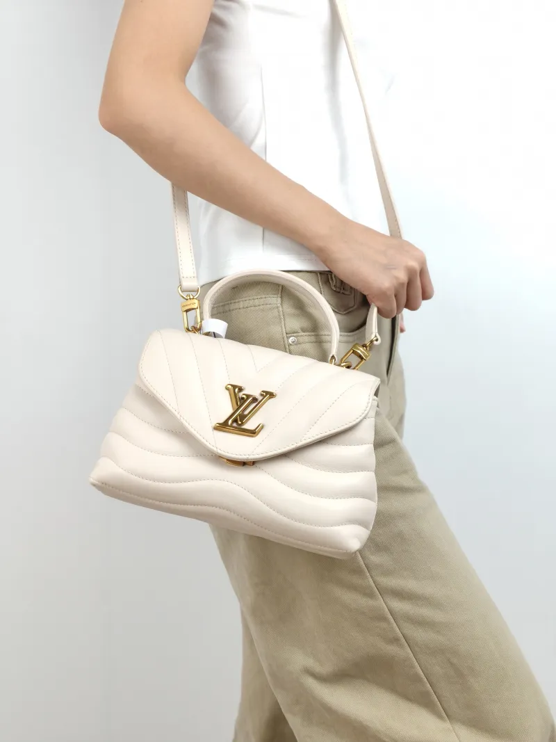 Louis Vuitton Crossbody Bag New Wave Hold Me Top Handle Bag White Calfskin One Size 23 × 10 × 15 cm — on-model view 2 of 3
