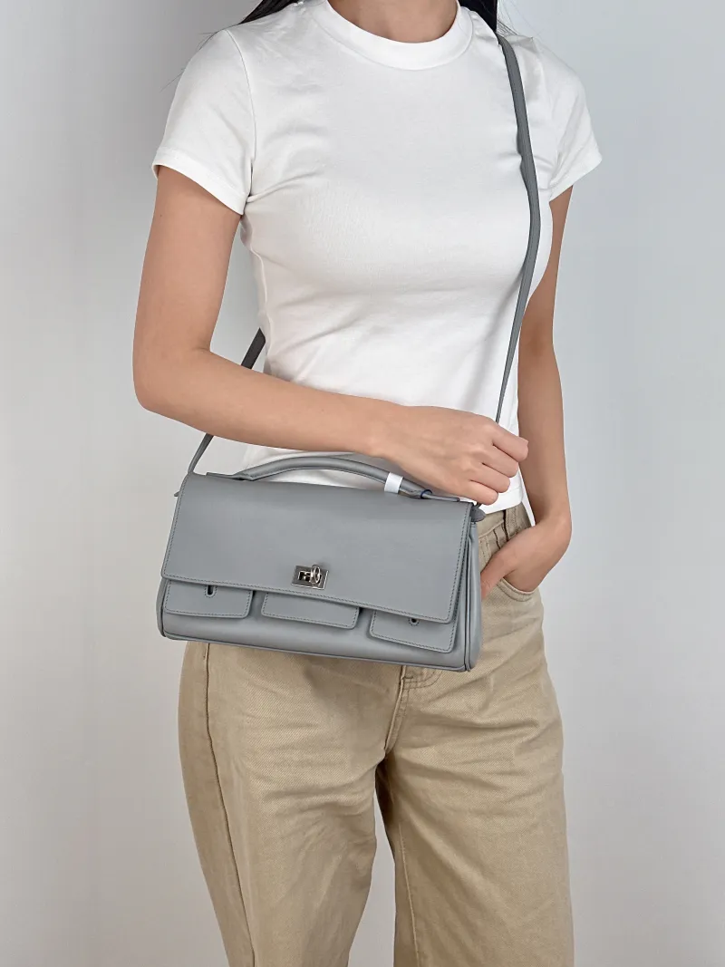 BALENCIAGA Crossbody Bag bel air Top Handle Crossbody Bag Grey Calfskin 27 × 5 × 14 cm — on-model view 2 of 3