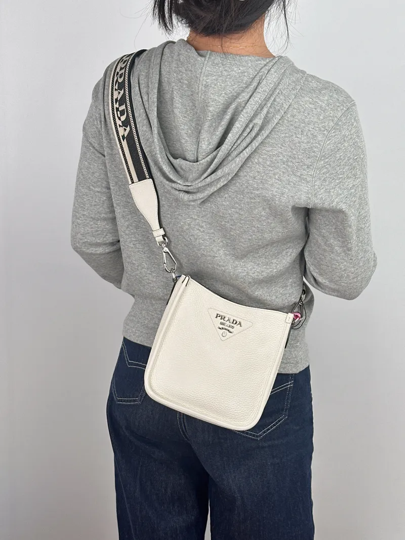 PRADA Crossbody Bag Crossbody Bag White Calfskin One Size 18 × 6.5 × 19.5 cm — on-model view 1 of 2