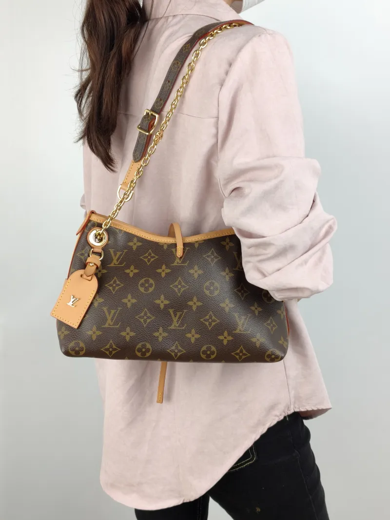 Louis Vuitton Crossbody Bag Carryall BB Monogram PVC BB 26 × 10 × 17 cm — on-model view 2 of 2