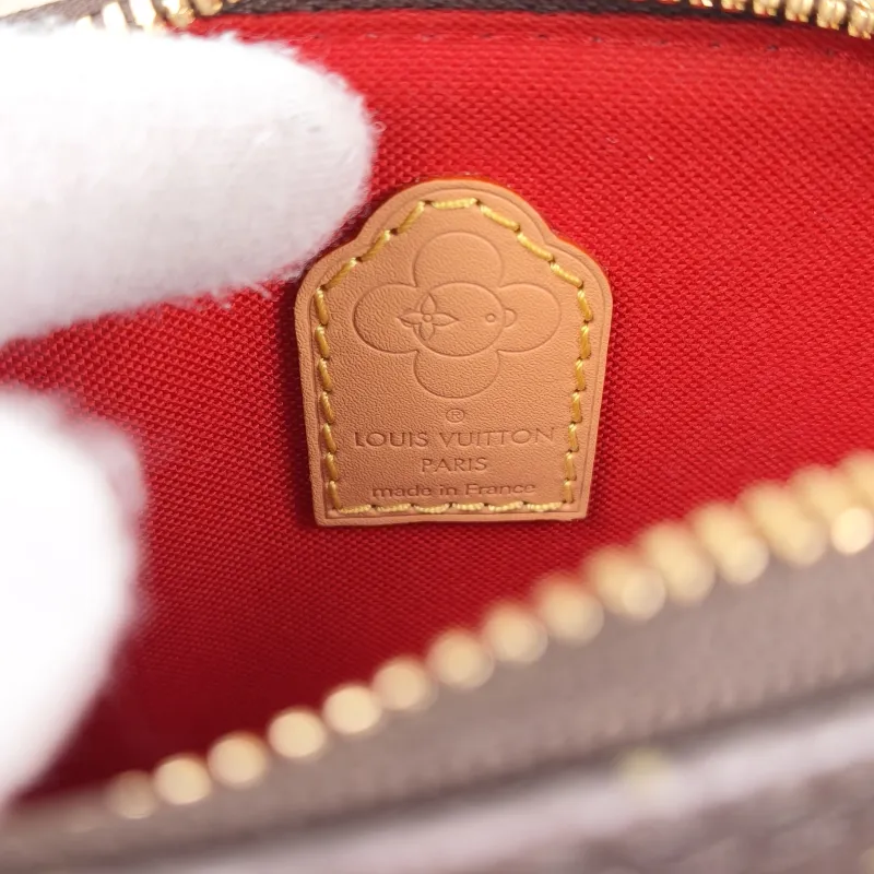 Louis Vuitton Crossbody Bag Alma Nano vivenne Monogram PVC nano 18 × 8 × 12 cm — detail view 1 of 11