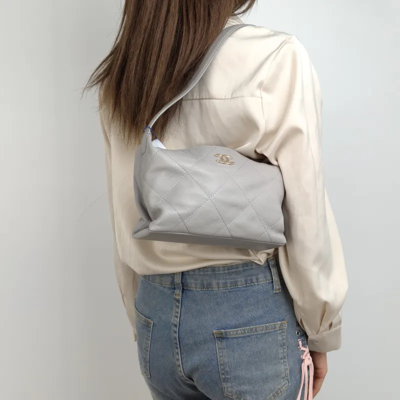 Chanel Shoulder Bag hobo Grey Lambskin 21.5 × 8.5 × 16 cm — on-model view 1 of 2