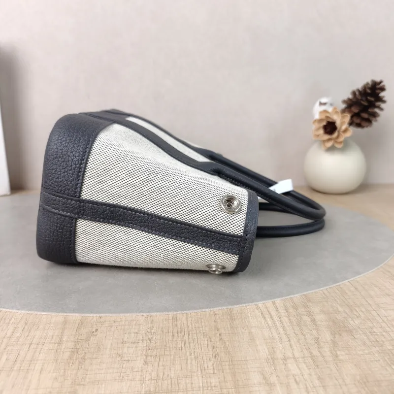 Hermès Top Handle Bag Neo Garden 23 Mini Beige · Canvas · Negonda Calfskinmini23 × 10 × 16 cm — detail view 9 of 11