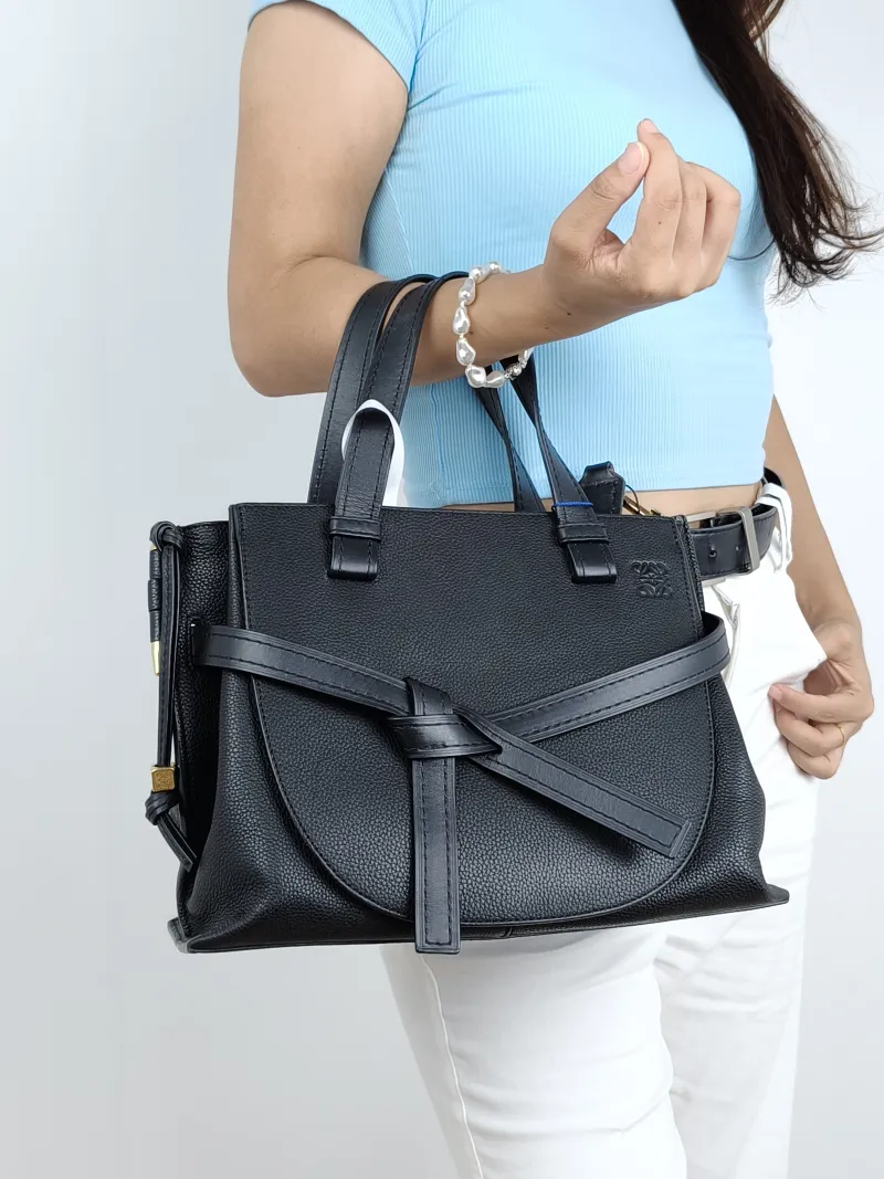 LOEWE Crossbody Baggate handbag Top Handle Bag Black Calfskin Small30 × 12 × 23.5 cm — on-model view 1 of 3