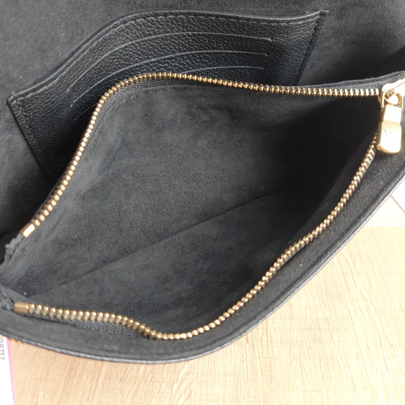 Louis Vuitton Crossbody Bag IVY Black Monogram Empreinte Embossed Calfskin Small 23.5 × 4.3 × 12 cm — detail view 4 of 11