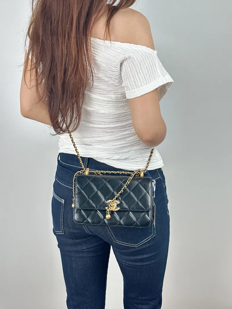 Chanel Crossbody Bag Black Calfskin Small19 × 8 × 12 cm — on-model view 2 of 2