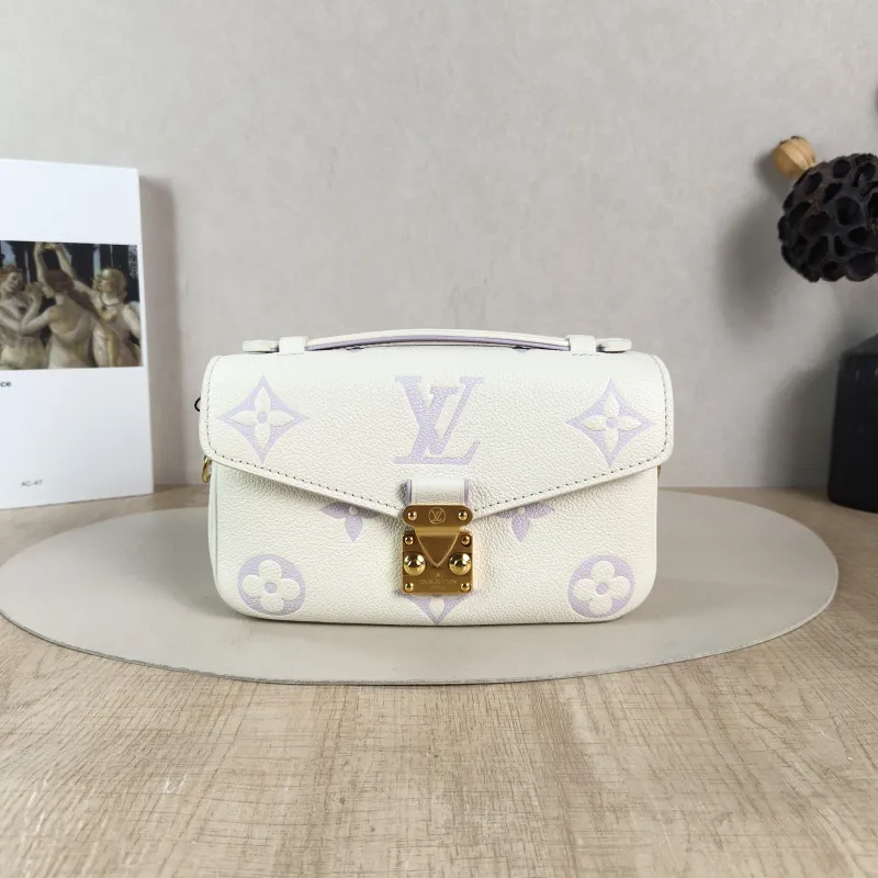 Louis Vuitton Crossbody Bag Pochette Métis East West White · Monogram Empreinte Embossed Calfskin Small 21.5 × 6 × 13.5 cm