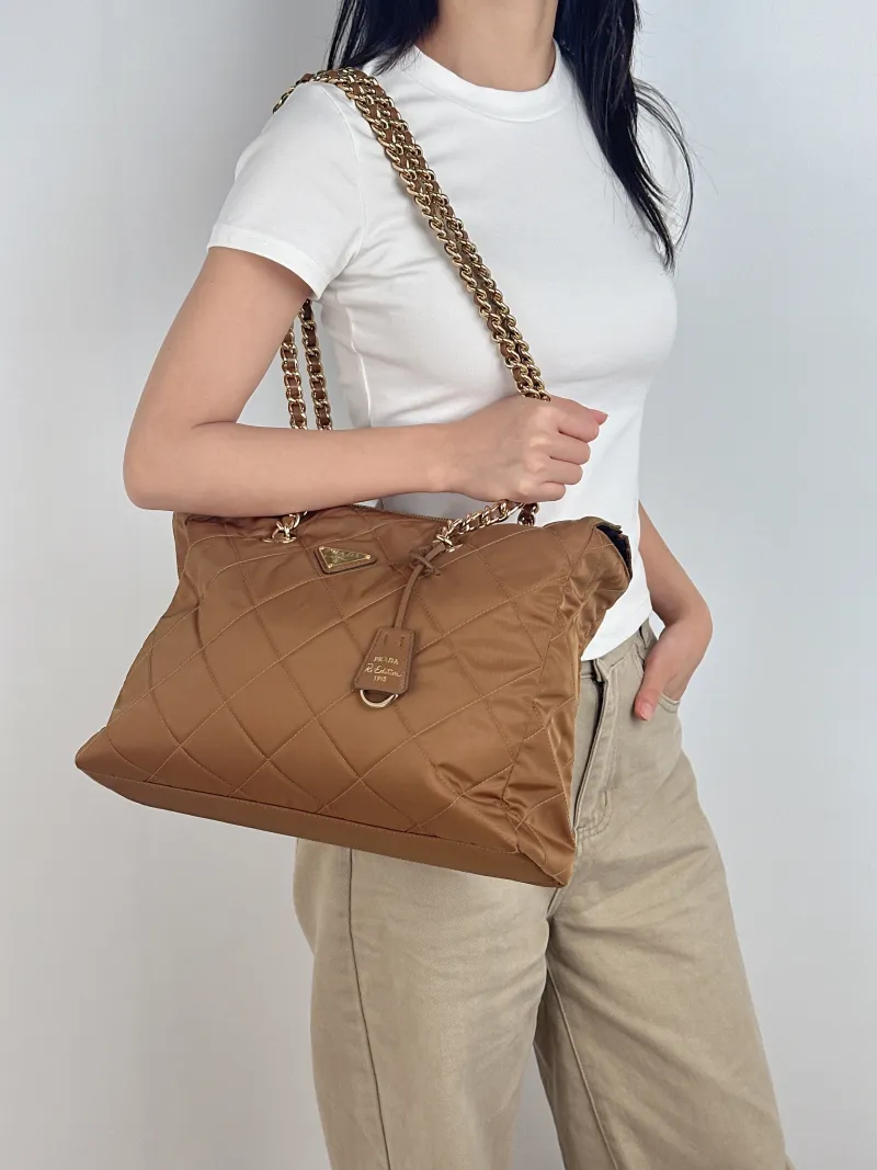 PRADA Shoulder Bag Re-Edition 1995 Brown Nylon One Size 36 × 11 × 25 cm — on-model view 2 of 2