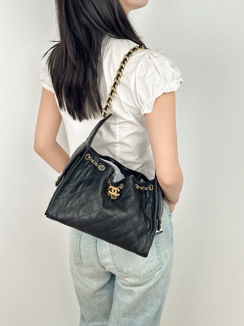 Chanel Shoulder Bag25Bag Black Grained Calfskin Small26 × 14 × 30 cm — on-model view 1 of 2