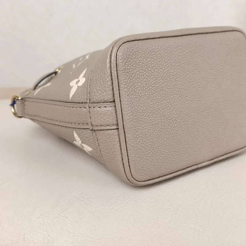 Louis Vuitton Crossbody Bag NANO NOÉ Bucket Bag Nano · White Empreinte Embossed Calfskin nano 13 × 10 × 16 cm — detail view 4 of 9