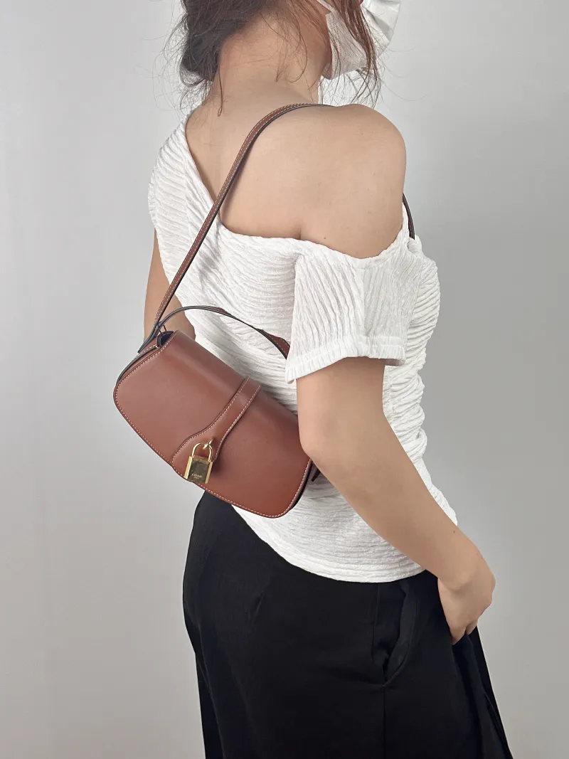 CELINE Crossbody Bag TABOU Brown Calfskinmini18 × 5 × 8 cm — on-model view 2 of 2