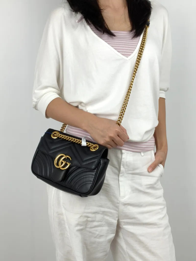 GUCCI Crossbody Bag GG Marmont Small Marmont 22 Black CC alfskin Small 22 × 6 × 13 cm — on-model view 3 of 3