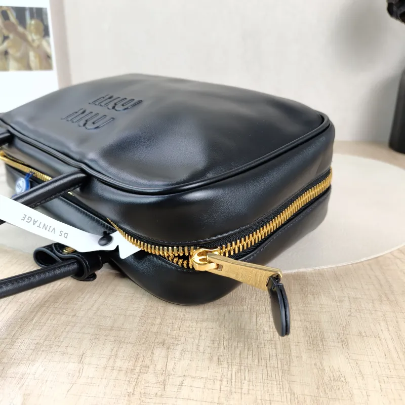 Miumiu Top Handle Bag Beau Black Calfskin Medium30 × 8.5 × 17 cm — detail view 1 of 12