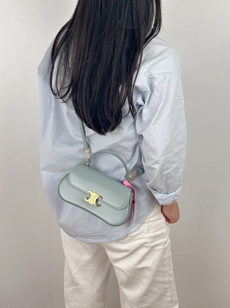 CELINE Crossbody Bag teen lola Crossbody Bag Blue Calfskin One Size 20 × 5 × 11.5 cm — on-model view 1 of 2