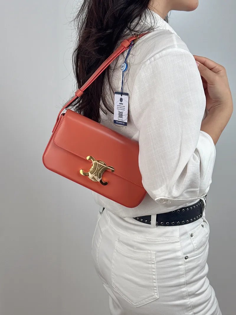 CELINE Shoulder Bag CLAUDE Shoulder Strap Edition Red Calfskin Medium 20.5 × 4 × 11.5 cm — on-model view 1 of 2
