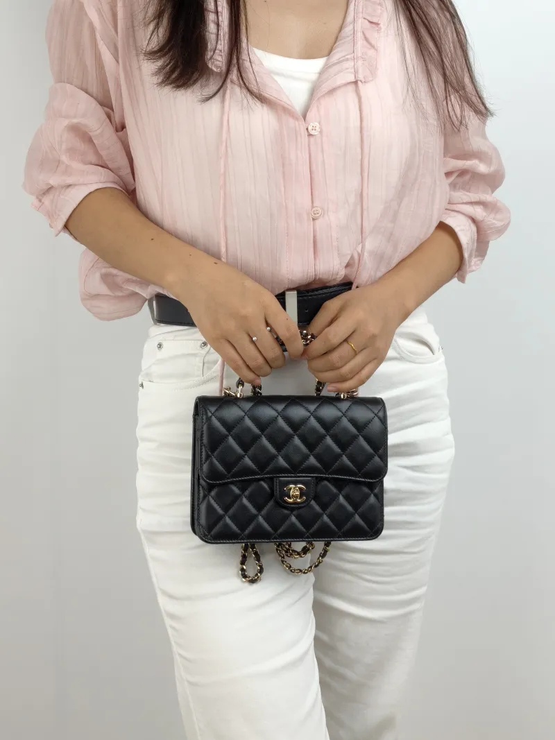 Chanel Backpack 25k Backpack Black Lambskin One Size 18.2 × 5 × 14 cm — on-model view 2 of 3