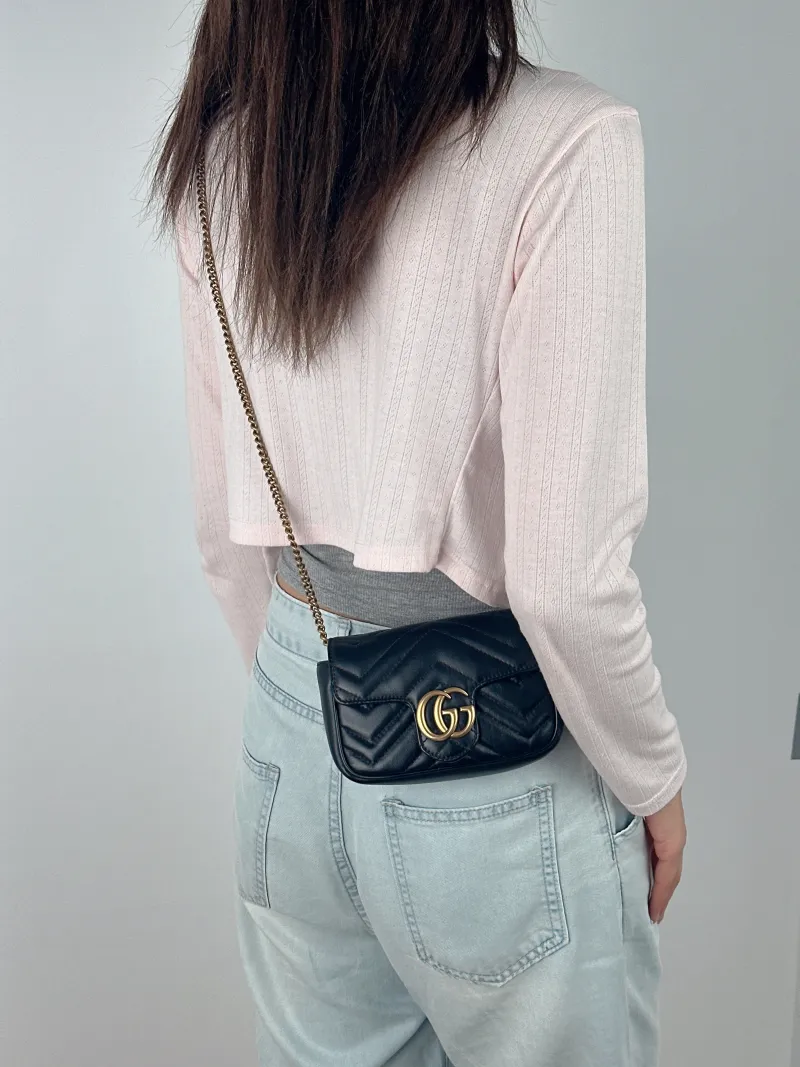 GUCCI Crossbody Bag GG Marmont Mini Marmont Mini Black Calfskinmini16.5 × 4.5 × 9.5 cm — on-model view 2 of 2