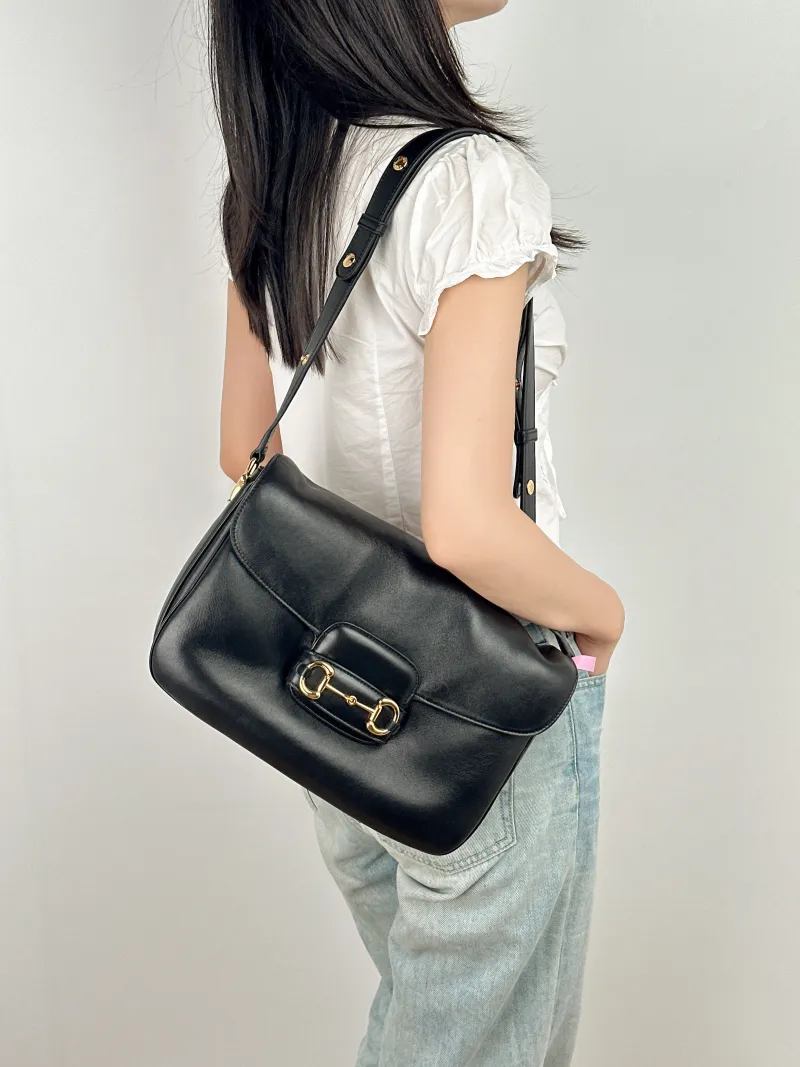 GUCCI Crossbody Bag Horsebit 1955 Horsebit Edition Medium Black Lambskin Medium 30 × 11 × 20.5 cm — on-model view 1 of 2