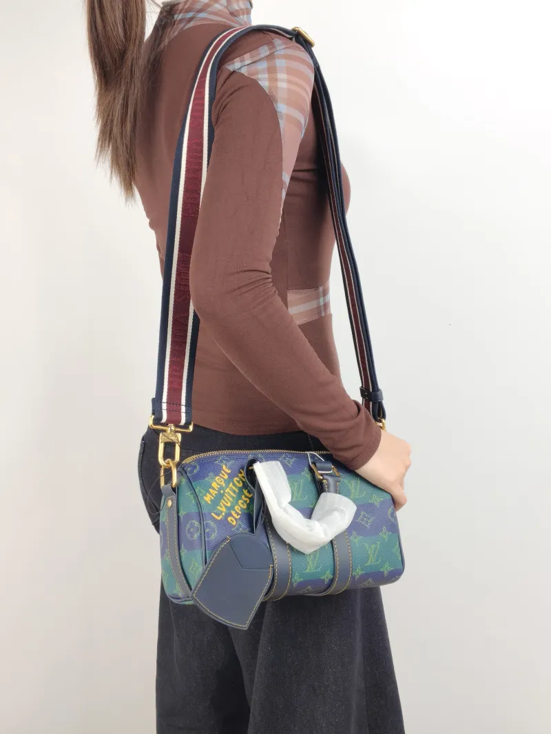 Louis Vuitton Crossbody Bag Keepall 25 Green Blue Monogram PVC Medium 25 × 11 × 15 cm — on-model view 3 of 3
