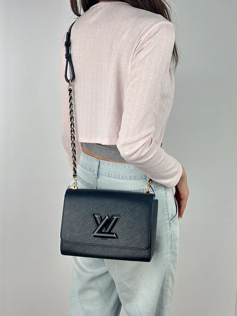 Louis Vuitton Crossbody Bag Twist Black Epi Embossed Calfskin Medium 23 × 9.5 × 17 cm — on-model view 2 of 2